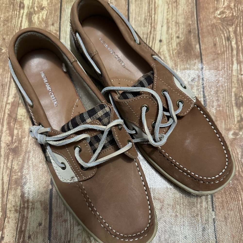 Highland Creek leather boat dockside